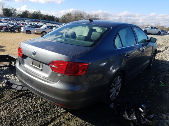 Photo 3 VIN: 3VWD07AJ4EM379961 - VOLKSWAGEN JETTA SE 