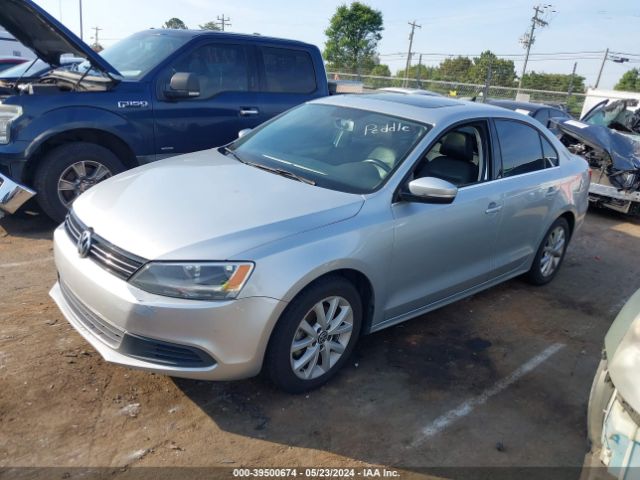 Photo 1 VIN: 3VWD07AJ4EM380897 - VOLKSWAGEN JETTA 