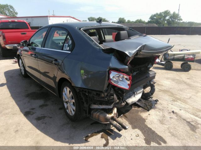 Photo 2 VIN: 3VWD07AJ4EM400971 - VOLKSWAGEN JETTA 