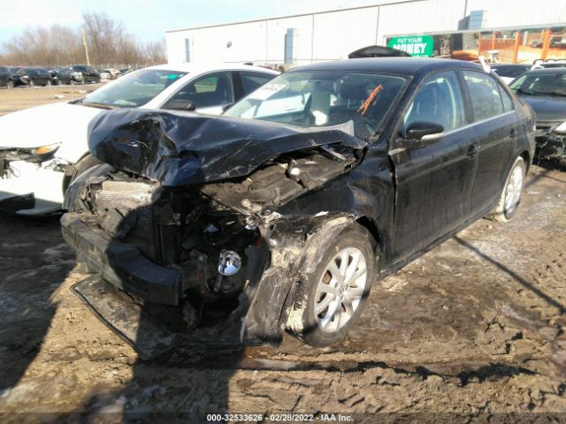 Photo 1 VIN: 3VWD07AJ4EM422808 - VOLKSWAGEN JETTA SEDAN 