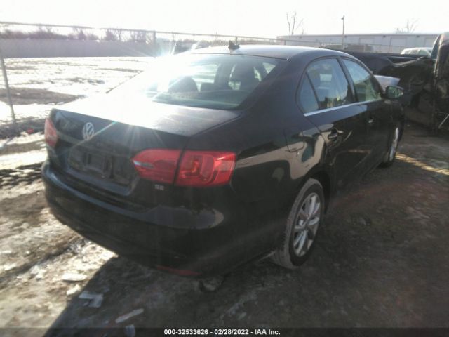 Photo 3 VIN: 3VWD07AJ4EM422808 - VOLKSWAGEN JETTA SEDAN 