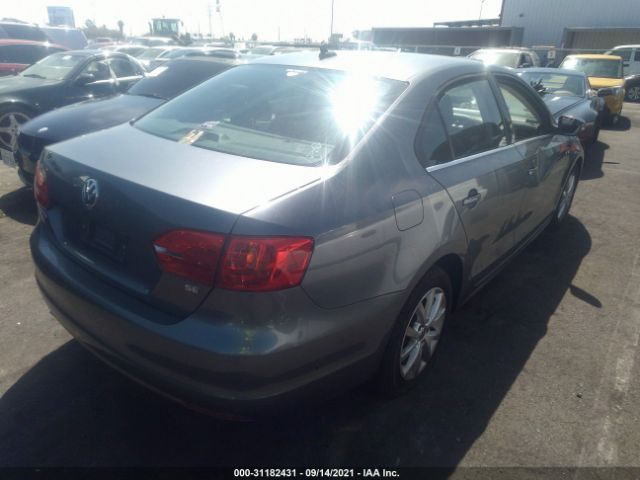 Photo 3 VIN: 3VWD07AJ4EM431931 - VOLKSWAGEN JETTA SEDAN 