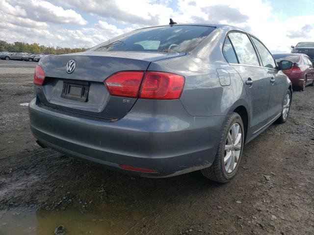 Photo 3 VIN: 3VWD07AJ4EM434506 - VOLKSWAGEN JETTA SE 