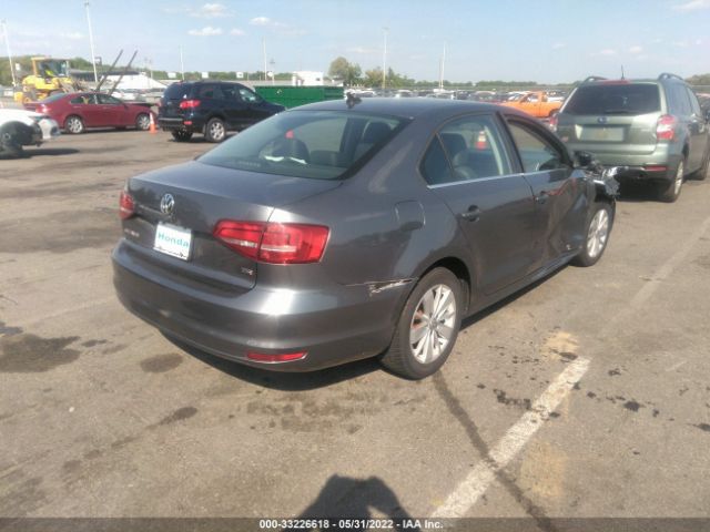 Photo 3 VIN: 3VWD07AJ4FM265363 - VOLKSWAGEN JETTA SEDAN 