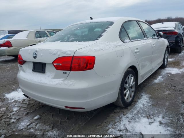 Photo 3 VIN: 3VWD07AJ5EM370038 - VOLKSWAGEN JETTA 