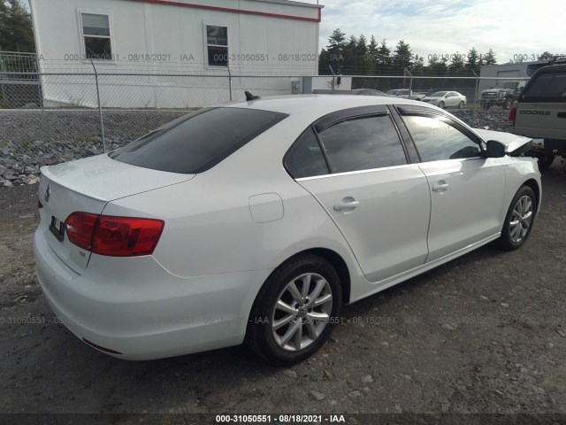 Photo 3 VIN: 3VWD07AJ6EM316814 - VOLKSWAGEN JETTA 