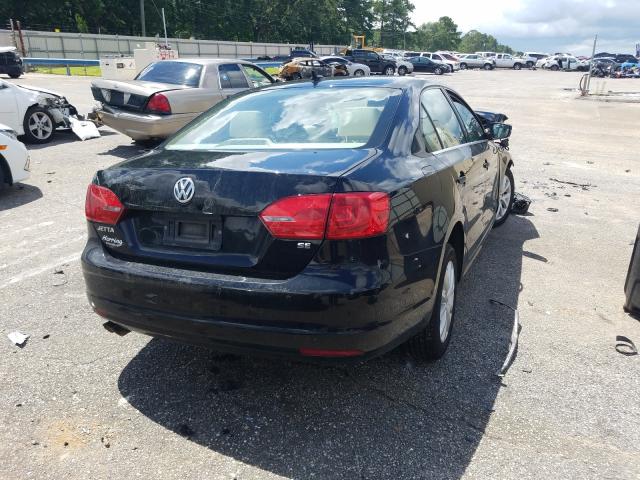 Photo 3 VIN: 3VWD07AJ6EM330339 - VOLKSWAGEN JETTA SE 