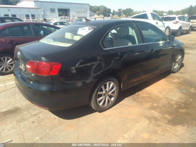 Photo 3 VIN: 3VWD07AJ6EM438573 - VOLKSWAGEN JETTA SEDAN 