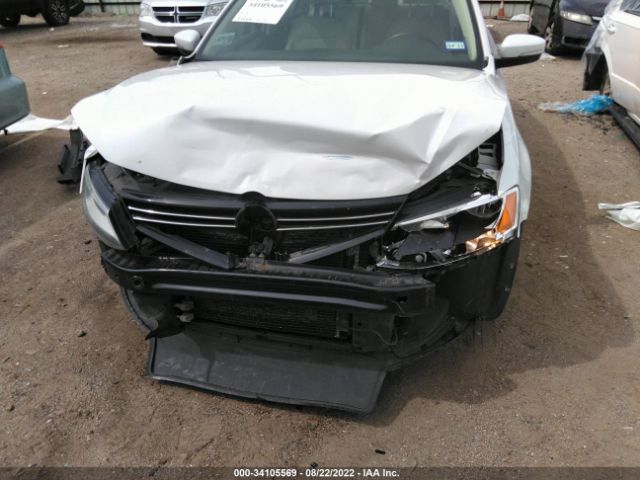 Photo 5 VIN: 3VWD07AJ7EM430272 - VOLKSWAGEN JETTA SEDAN 