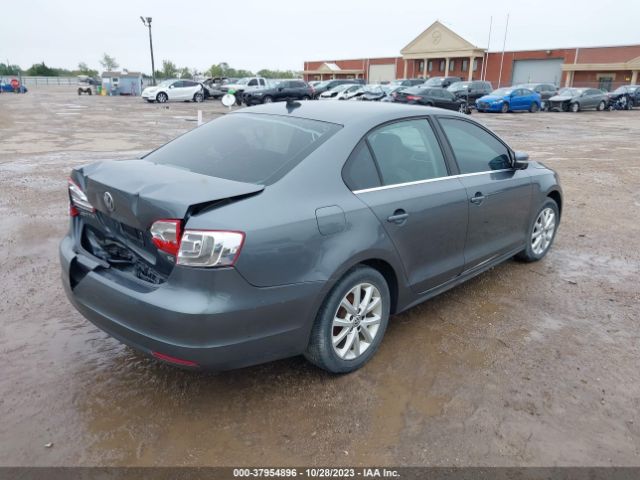 Photo 3 VIN: 3VWD07AJ8EM384631 - VOLKSWAGEN JETTA 