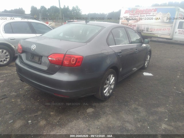 Photo 3 VIN: 3VWD07AJ8EM438428 - VOLKSWAGEN JETTA SEDAN 