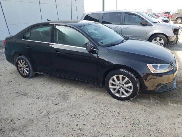 Photo 3 VIN: 3VWD07AJ9EM400612 - VOLKSWAGEN JETTA SE 