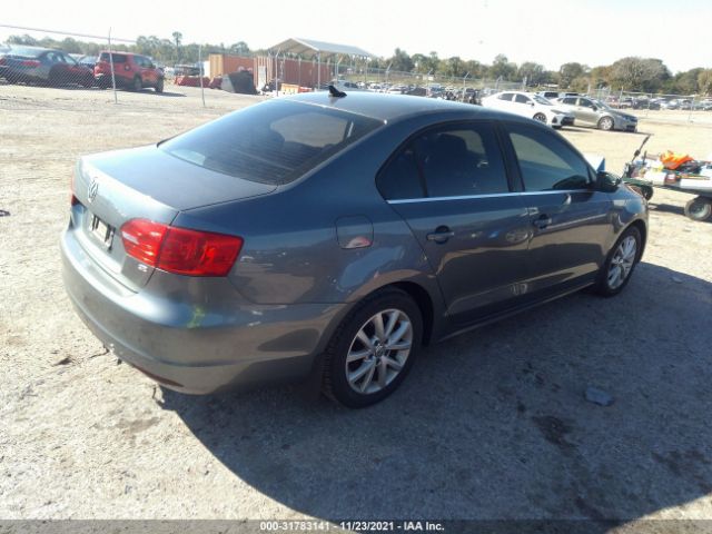 Photo 3 VIN: 3VWD07AJXEM316895 - VOLKSWAGEN JETTA SEDAN 