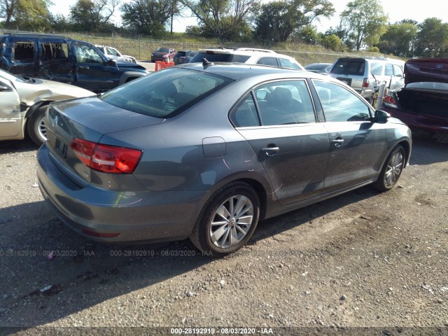 Photo 3 VIN: 3VWD07AJXFM339594 - VOLKSWAGEN JETTA SEDAN 