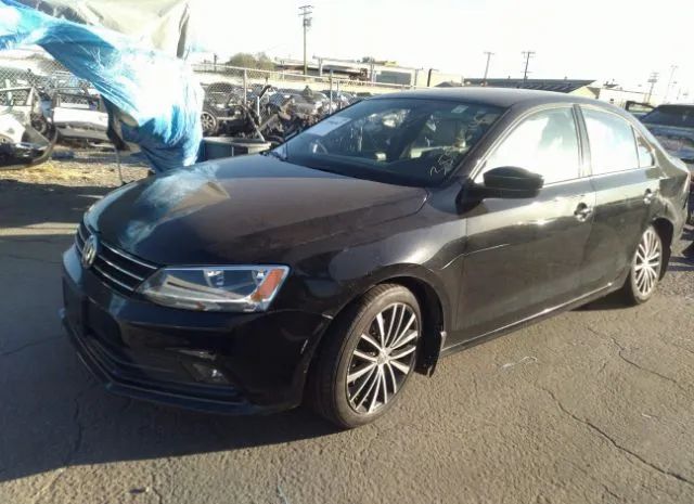 Photo 1 VIN: 3VWD17AJ0GM279386 - VOLKSWAGEN JETTA SEDAN 