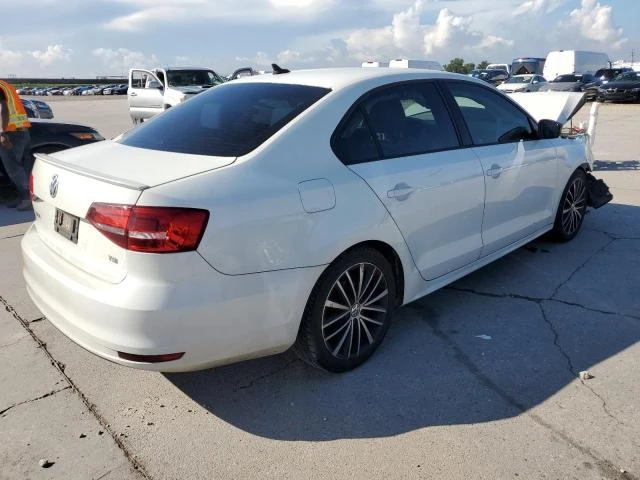 Photo 2 VIN: 3VWD17AJ1GM253945 - VOLKSWAGEN JETTA SPOR 