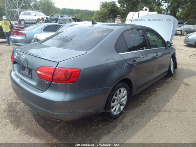 Photo 3 VIN: 3VWD17AJ2EM322199 - VOLKSWAGEN JETTA SEDAN 