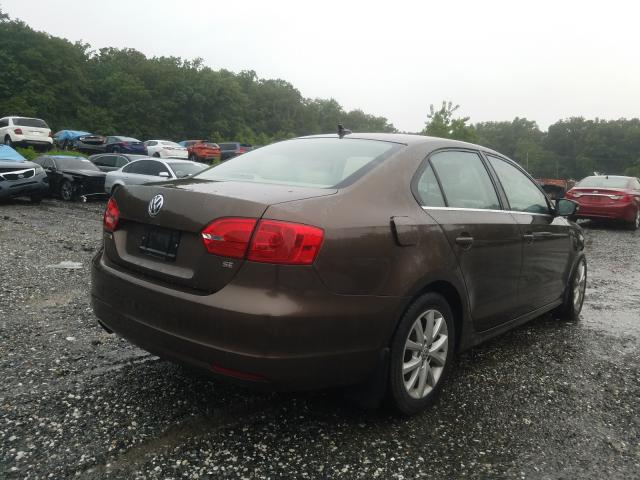 Photo 3 VIN: 3VWD17AJ7EM242798 - VOLKSWAGEN JETTA SE 