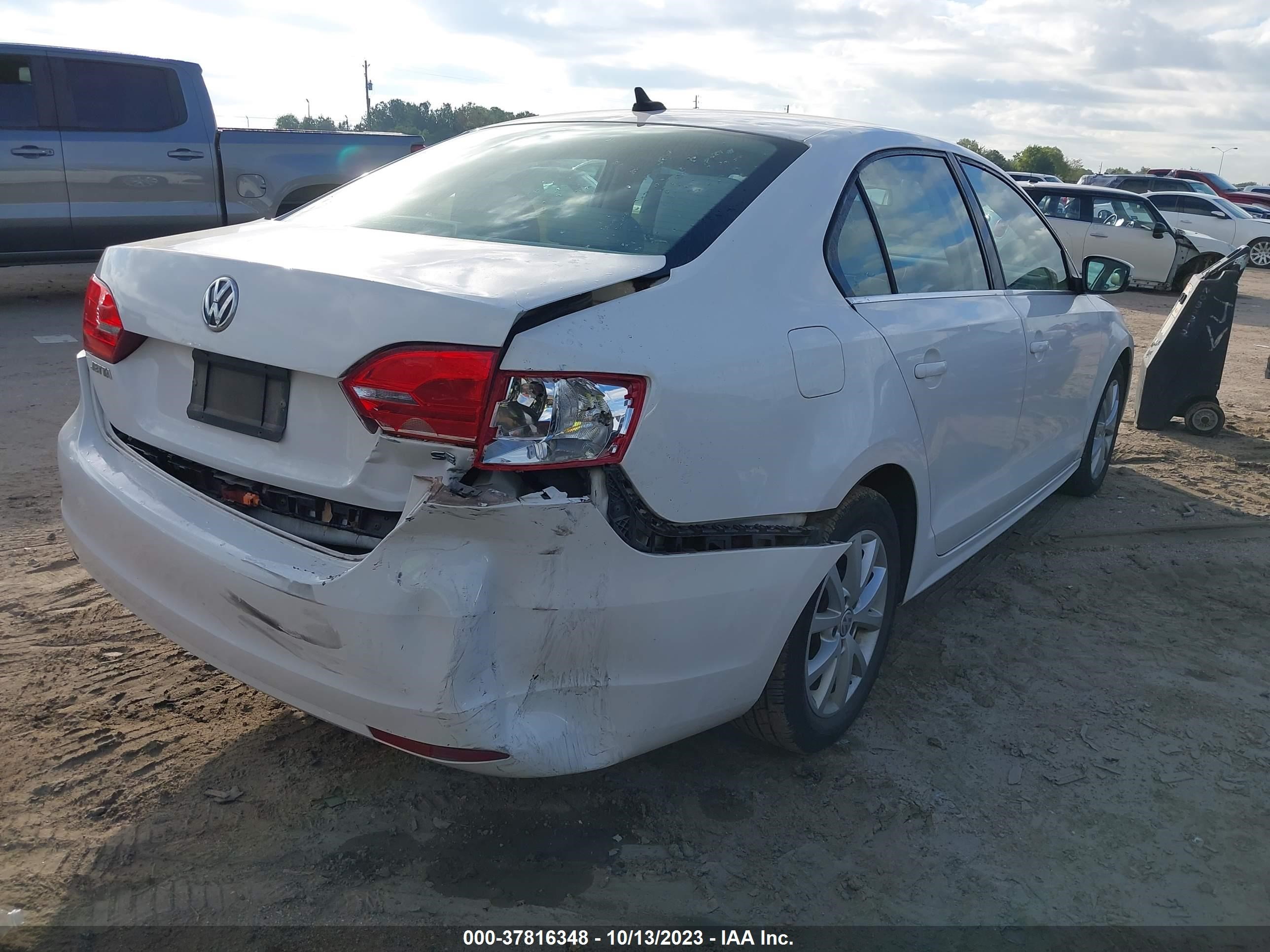 Photo 3 VIN: 3VWD17AJ7EM354534 - VOLKSWAGEN JETTA 