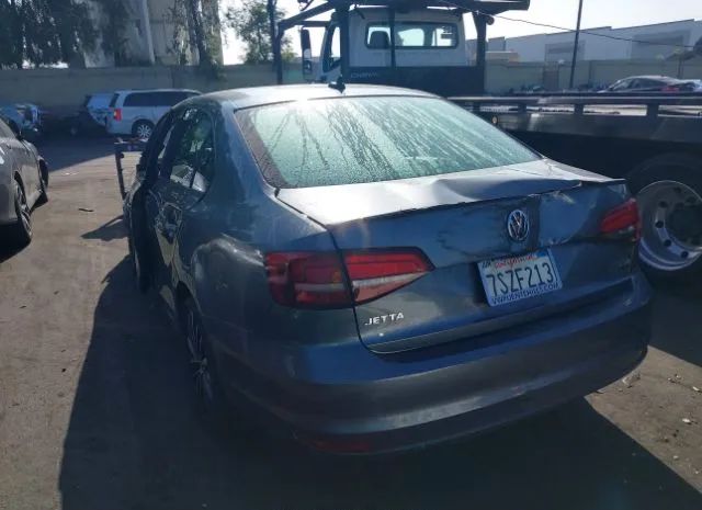 Photo 2 VIN: 3VWD17AJ7GM388878 - VOLKSWAGEN JETTA 