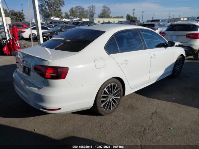 Photo 3 VIN: 3VWD17AJ8GM229044 - VOLKSWAGEN JETTA 