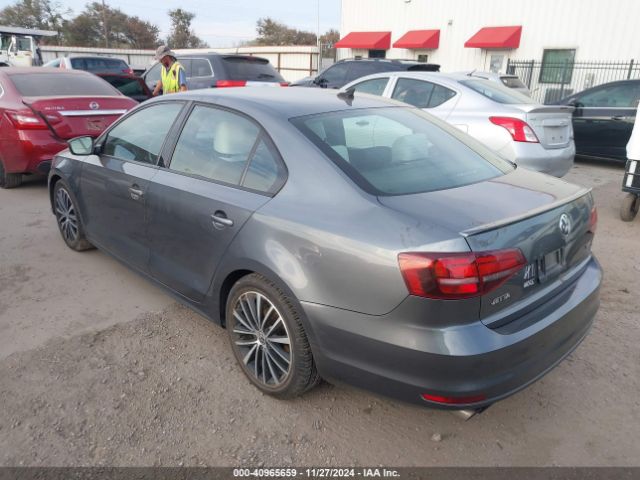 Photo 2 VIN: 3VWD17AJ8GM386654 - VOLKSWAGEN JETTA 