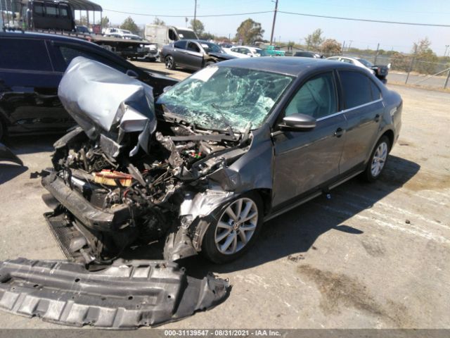 Photo 1 VIN: 3VWD17AJ9EM334687 - VOLKSWAGEN JETTA SEDAN 