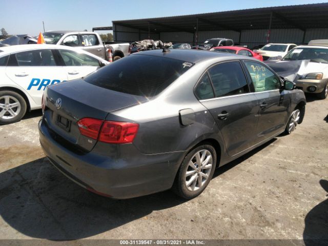 Photo 3 VIN: 3VWD17AJ9EM334687 - VOLKSWAGEN JETTA SEDAN 