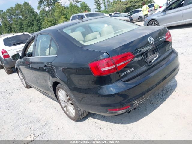 Photo 2 VIN: 3VWD17AJ9FM211490 - VOLKSWAGEN JETTA 