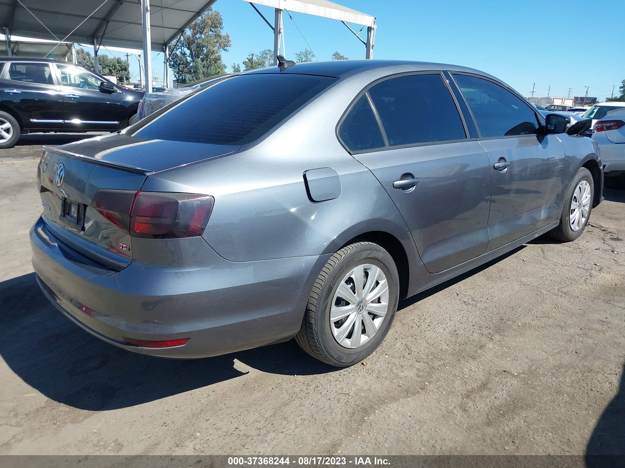 Photo 3 VIN: 3VWD17AJ9JM232722 - VOLKSWAGEN JETTA 