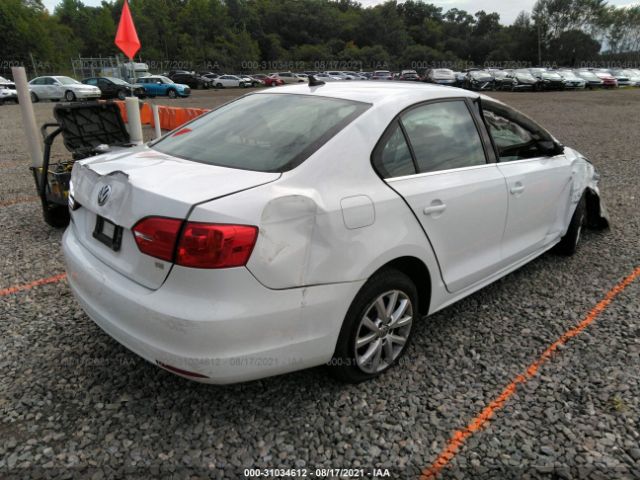 Photo 3 VIN: 3VWD17AJXEM332883 - VOLKSWAGEN JETTA SEDAN 