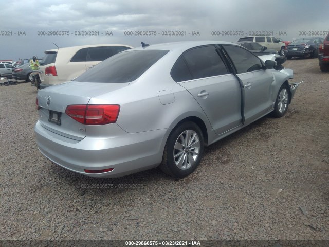 Photo 3 VIN: 3VWD17AJXFM264277 - VOLKSWAGEN JETTA SEDAN 