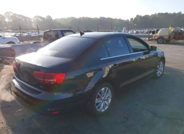 Photo 3 VIN: 3VWD17AJXFM407597 - VOLKSWAGEN JETTA SEDAN 