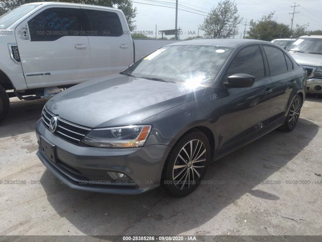 Photo 1 VIN: 3VWD17AJXGM302270 - VOLKSWAGEN JETTA SEDAN 