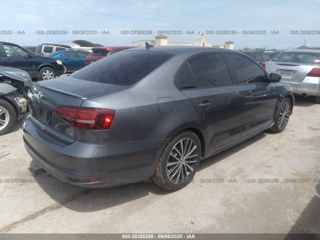 Photo 3 VIN: 3VWD17AJXGM302270 - VOLKSWAGEN JETTA SEDAN 