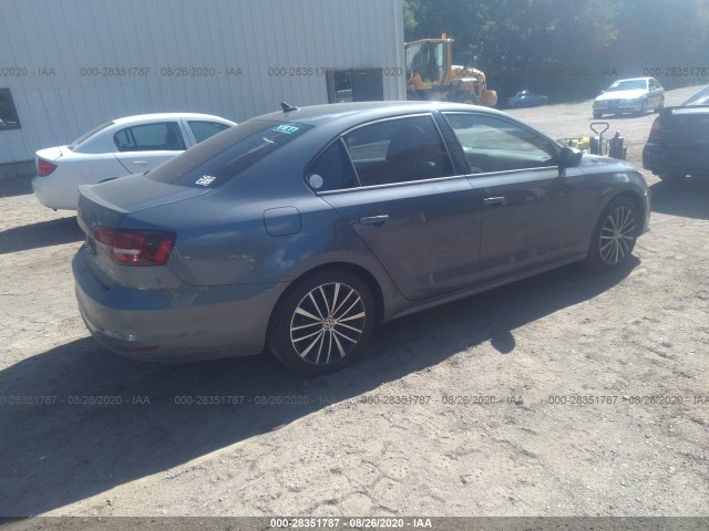 Photo 3 VIN: 3VWD17AJXGM329985 - VOLKSWAGEN JETTA 