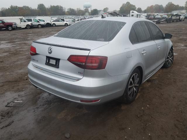 Photo 3 VIN: 3VWD67AJ0GM209078 - VOLKSWAGEN JETTA SE 