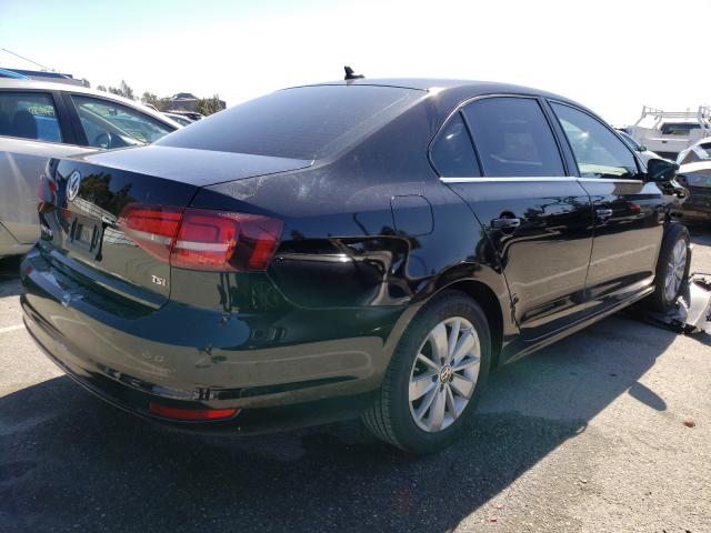 Photo 3 VIN: 3VWD67AJ0GM300223 - VOLKSWAGEN JETTA SE 