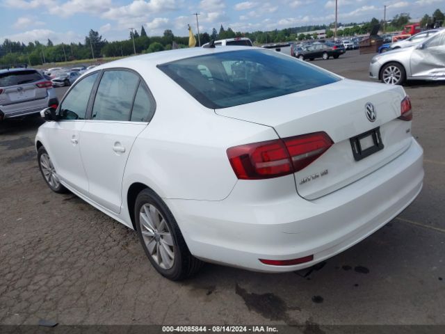 Photo 2 VIN: 3VWD67AJ0GM339202 - VOLKSWAGEN JETTA 