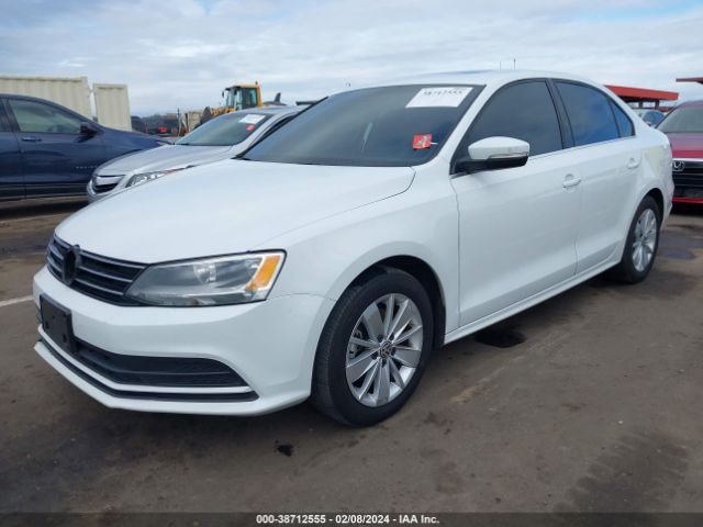 Photo 1 VIN: 3VWD67AJ0GM399450 - VOLKSWAGEN JETTA 