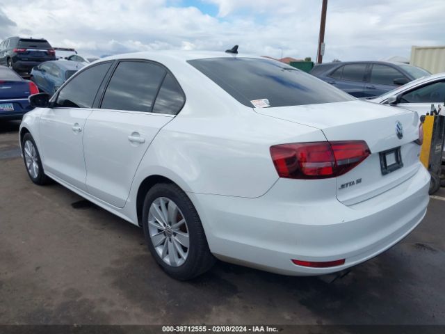 Photo 2 VIN: 3VWD67AJ0GM399450 - VOLKSWAGEN JETTA 