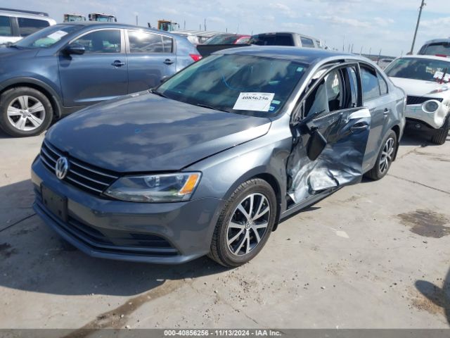 Photo 1 VIN: 3VWD67AJ1GM371740 - VOLKSWAGEN JETTA 