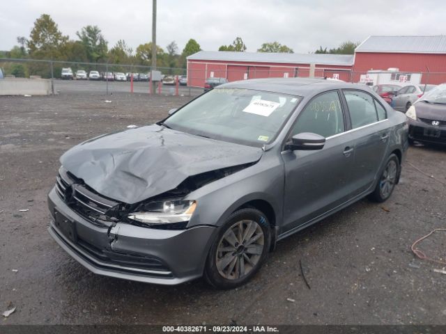 Photo 1 VIN: 3VWD67AJ1GM400976 - VOLKSWAGEN JETTA 