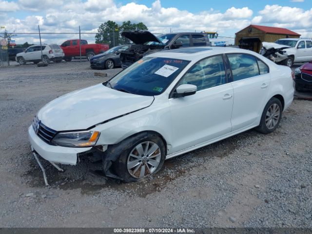 Photo 1 VIN: 3VWD67AJ2GM339377 - VOLKSWAGEN JETTA 