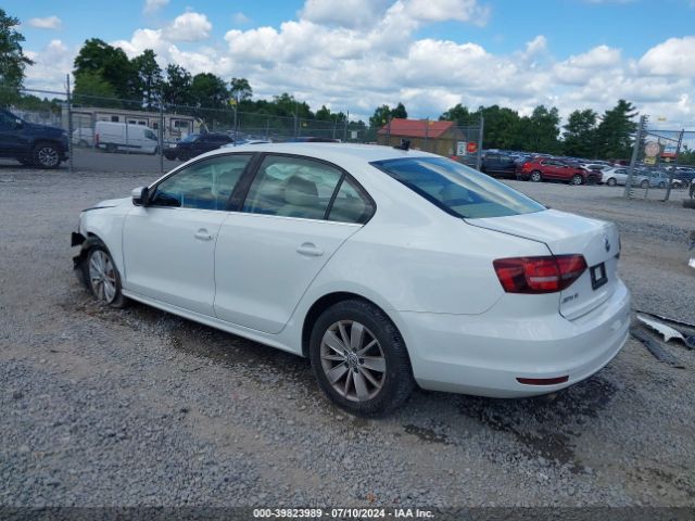 Photo 2 VIN: 3VWD67AJ2GM339377 - VOLKSWAGEN JETTA 