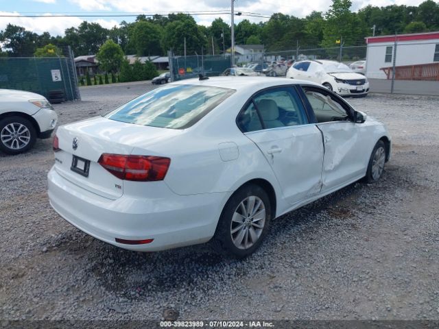 Photo 3 VIN: 3VWD67AJ2GM339377 - VOLKSWAGEN JETTA 