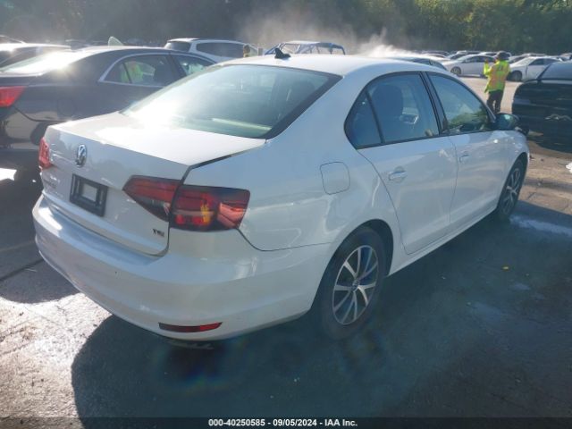 Photo 3 VIN: 3VWD67AJ2GM393553 - VOLKSWAGEN JETTA 