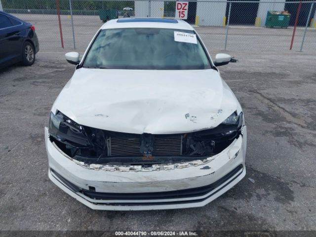 Photo 5 VIN: 3VWD67AJ2GM408925 - VOLKSWAGEN JETTA 