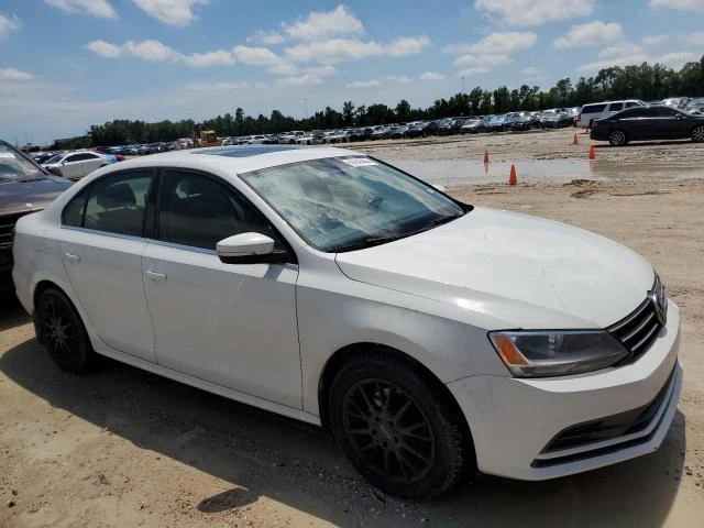 Photo 3 VIN: 3VWD67AJ3GM232113 - VOLKSWAGEN JETTA SE 