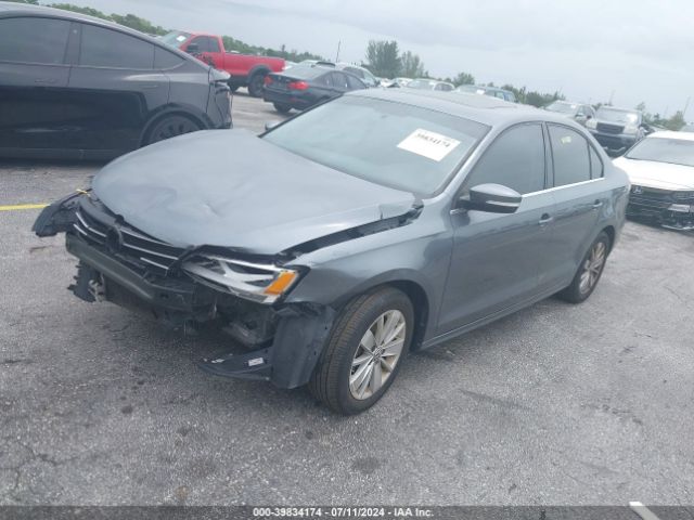 Photo 1 VIN: 3VWD67AJ3GM313757 - VOLKSWAGEN JETTA 